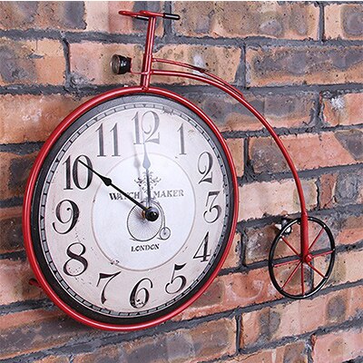 Vintage wandklok in fiets vorm
