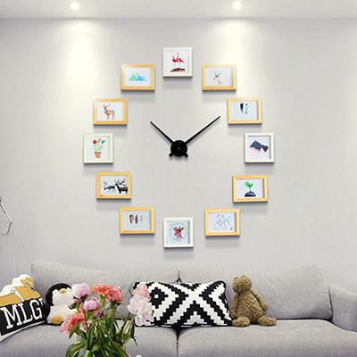 Moderne DIY wandklok met fotolijsten