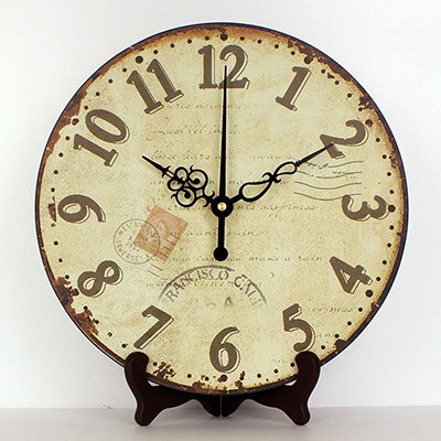 Ronde vintage tafelklok op standaard