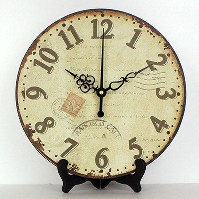 Ronde vintage tafelklok op standaard