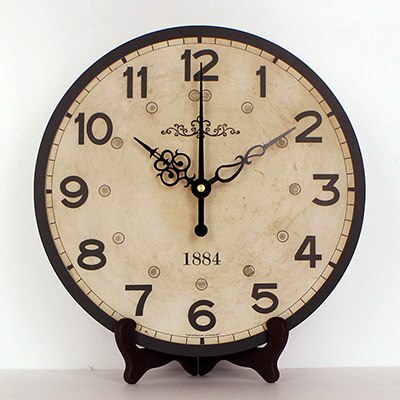 Ronde vintage tafelklok op standaard