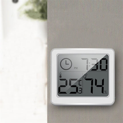 Witte digitale bureauklok met thermometer
