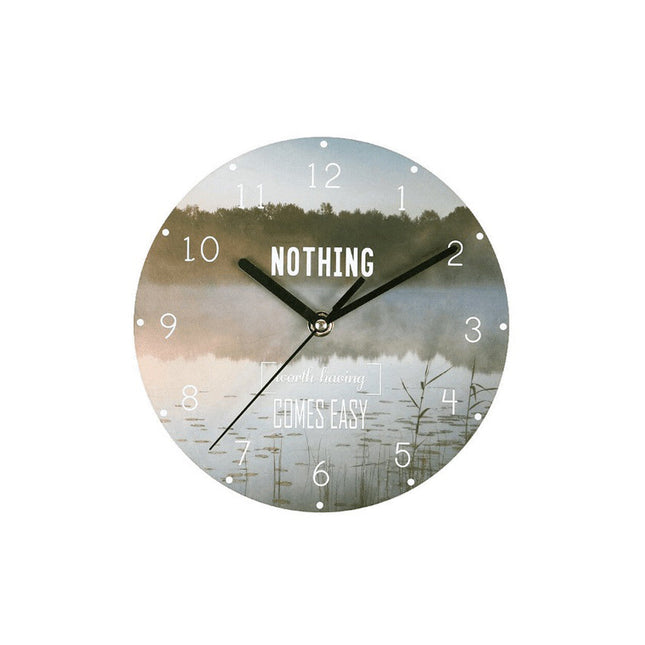 Wandklok met inspirerende Engelse tekst