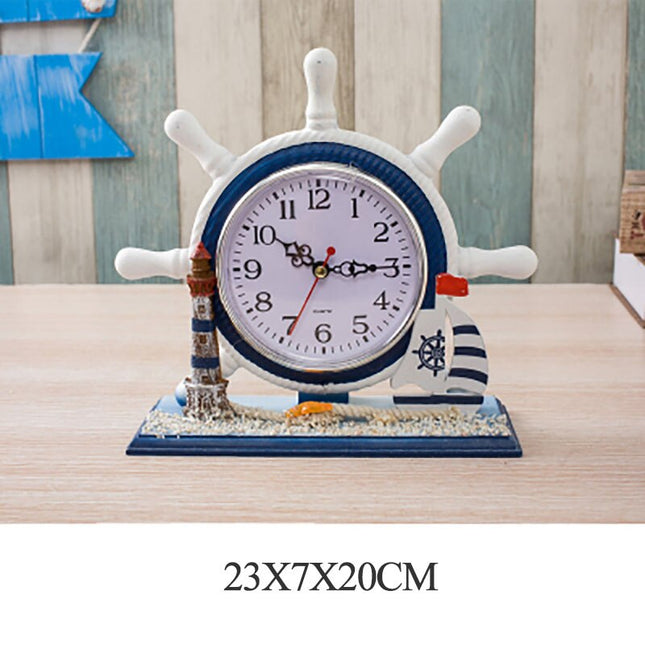 Tafelklok met stuurwiel en vuurtoren