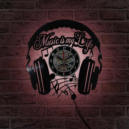 Muziek koptelefoon vinylplaat klok