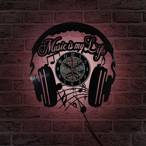 Muziek koptelefoon vinylplaat klok
