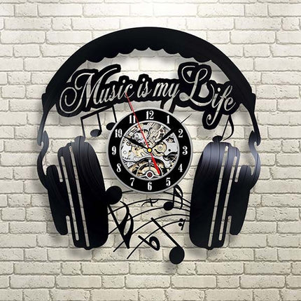 Muziek koptelefoon vinylplaat klok