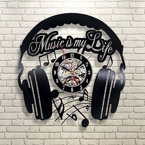 Muziek koptelefoon vinylplaat klok