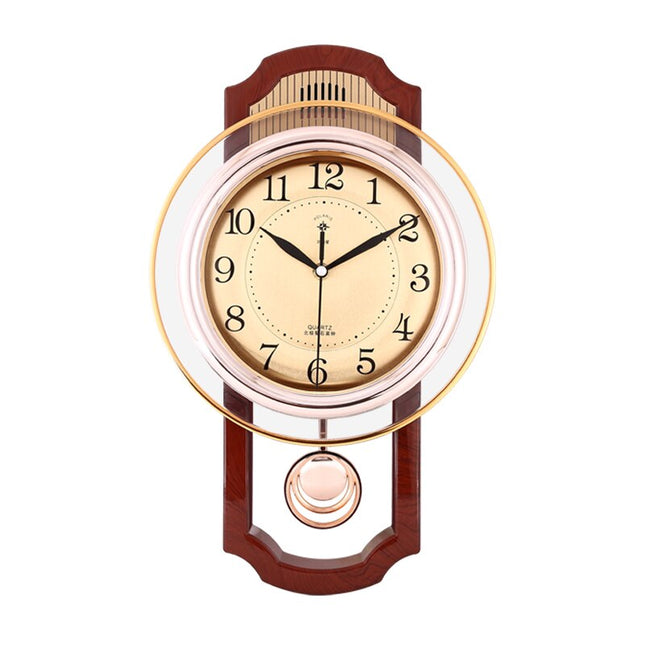 Goudkleurige vintage wandklok met slinger