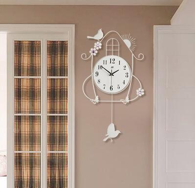 Wandklok vogelhuisje design met slinger