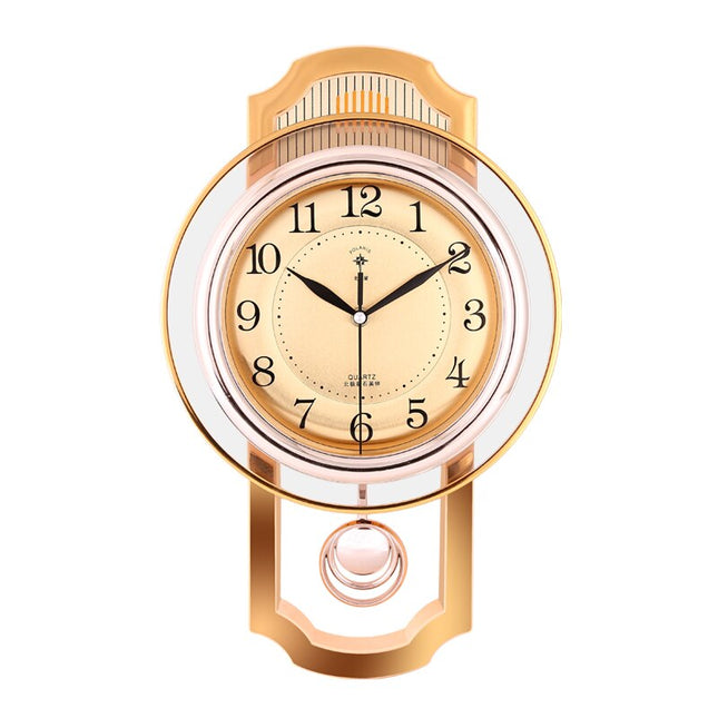 Goudkleurige vintage wandklok met slinger