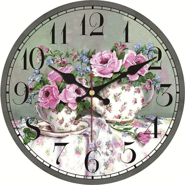 Romantische wandklok met roze bloemen