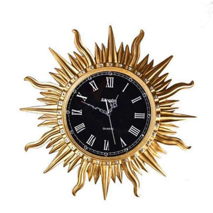 Grote wandklok zon design goudkleurig