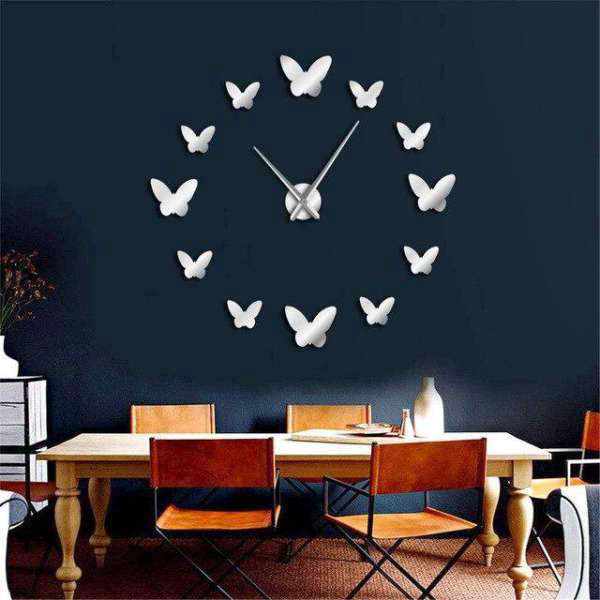 Moderne 3D wandklok met vlinders