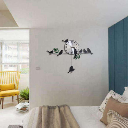 Grote wandklok met vogels slinger