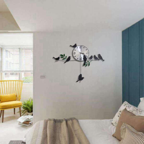 Grote wandklok met vogels slinger