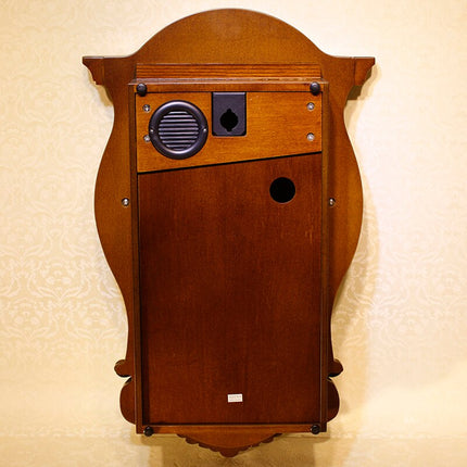 Klassieke houten wandklok met slinger