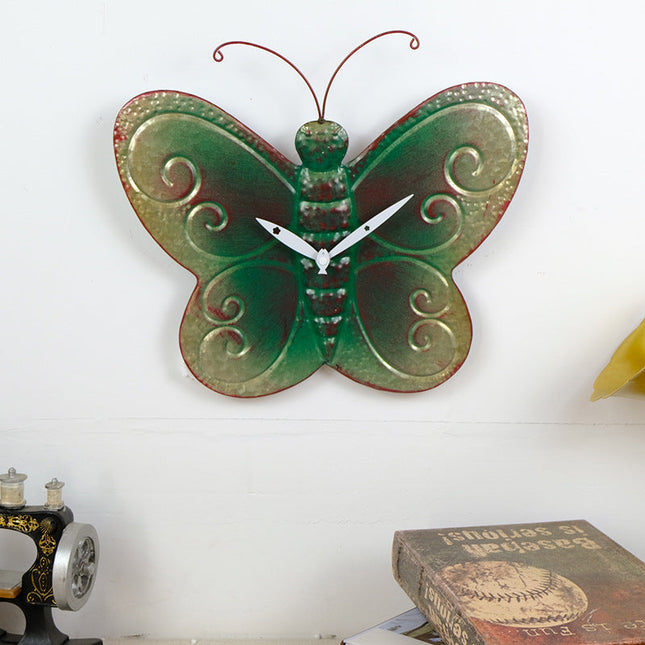 Wandklok in esdoornblad vorm