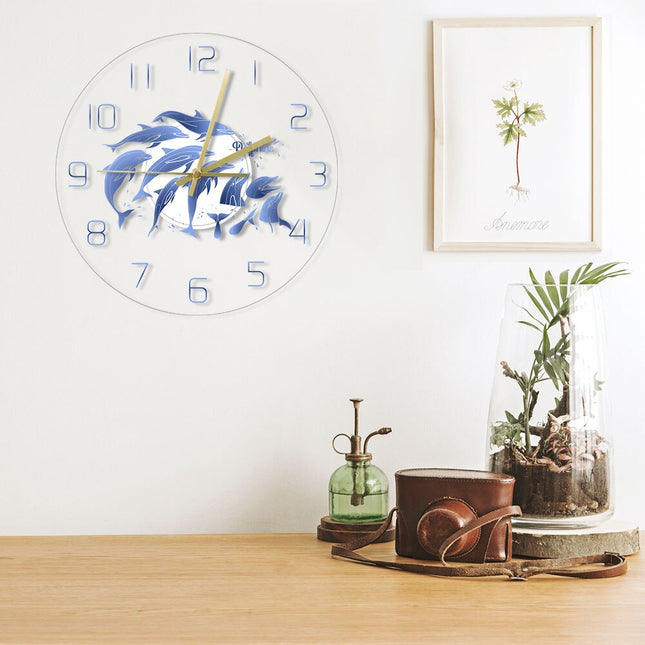 Mooie wandklok met springende dolfijnen