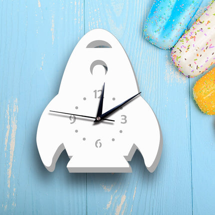 Witte kinderklok in vorm van raket