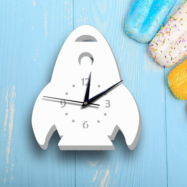 Witte kinderklok in vorm van raket