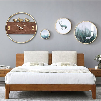 Design houten wandklok met gouden vogels