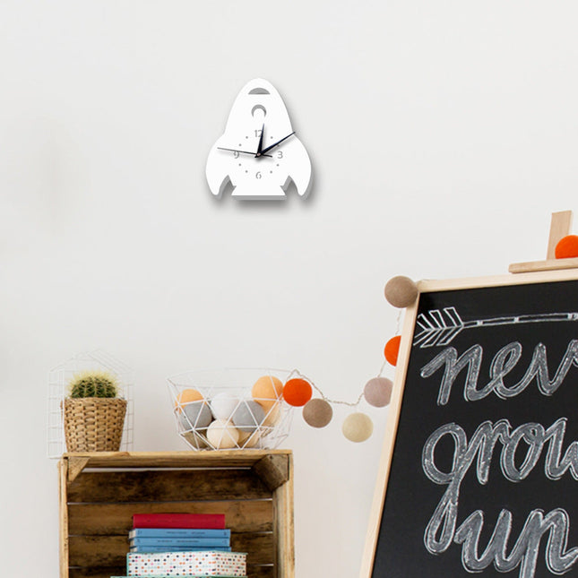 Witte kinderklok in vorm van raket