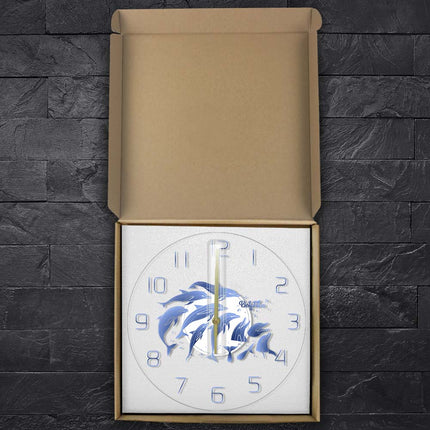 Mooie wandklok met springende dolfijnen