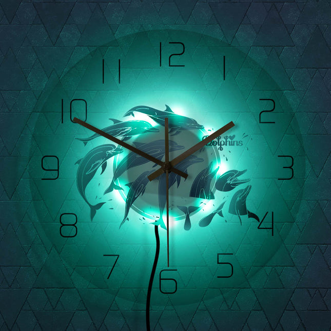 Mooie wandklok met springende dolfijnen