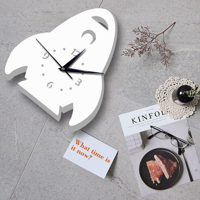 Witte kinderklok in vorm van raket