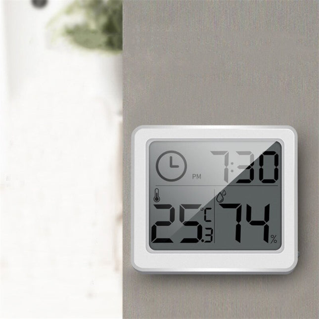 Witte digitale bureauklok met thermometer