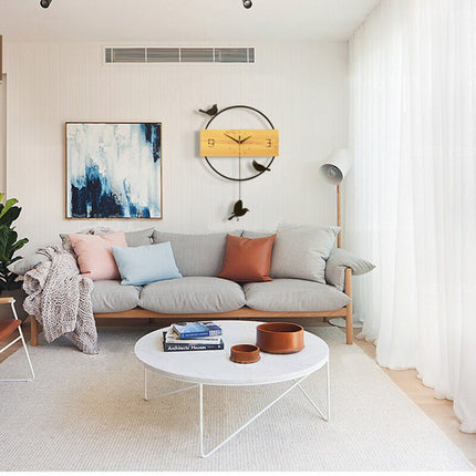 Moderne houten wandklok met vogels