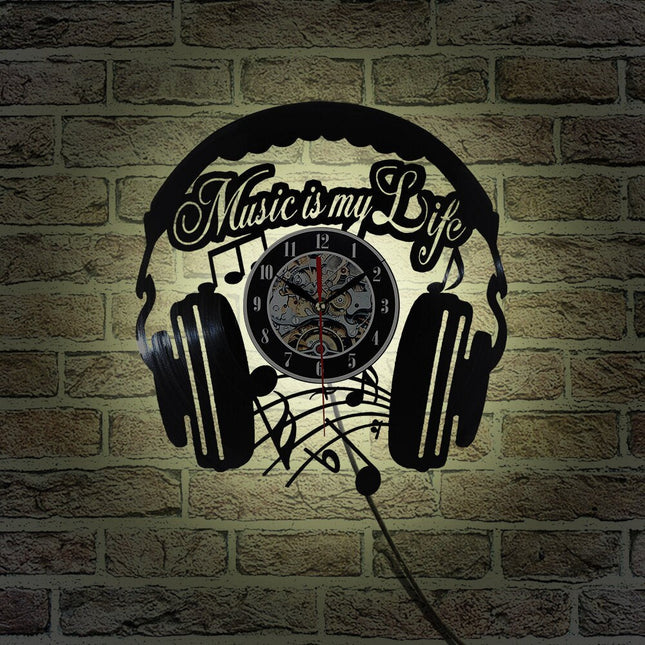Muziek koptelefoon vinylplaat klok