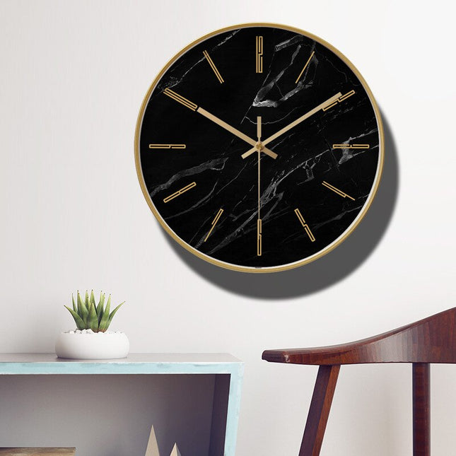 Ronde wandklok met marmerlook en goud