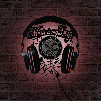 Muziek koptelefoon vinylplaat klok