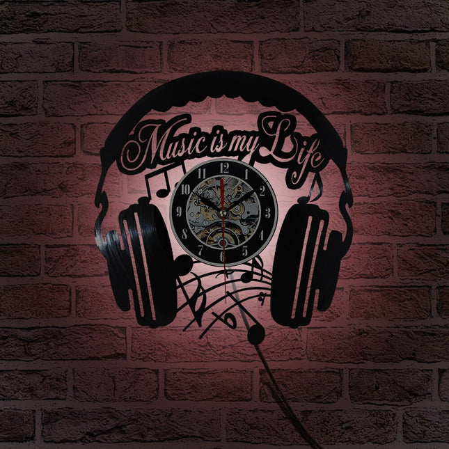 Muziek koptelefoon vinylplaat klok