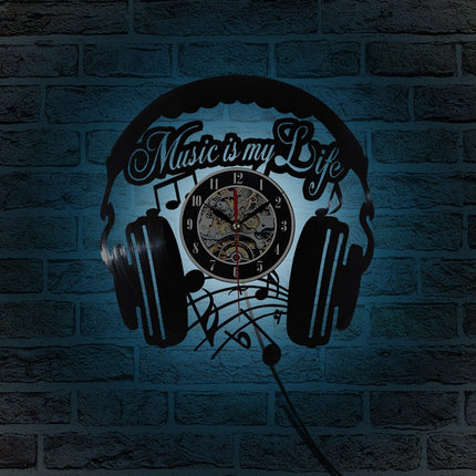 Muziek koptelefoon vinylplaat klok