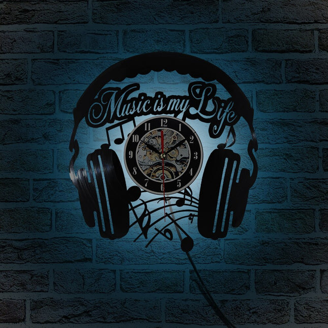 Muziek koptelefoon vinylplaat klok