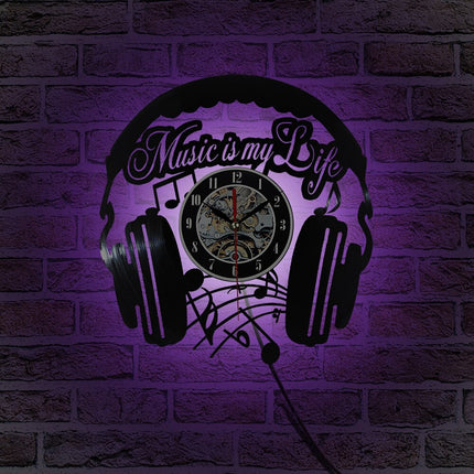 Muziek koptelefoon vinylplaat klok