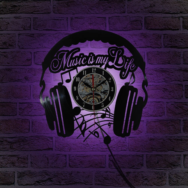 Muziek koptelefoon vinylplaat klok