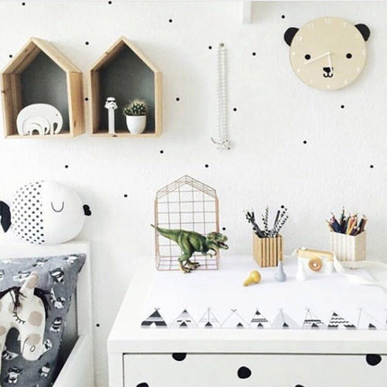 Houten kinderklok in kuikenvorm