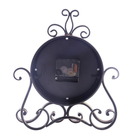 Vintage tafelklok met octopus standaard