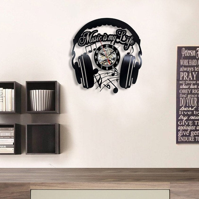 Muziek koptelefoon vinylplaat klok