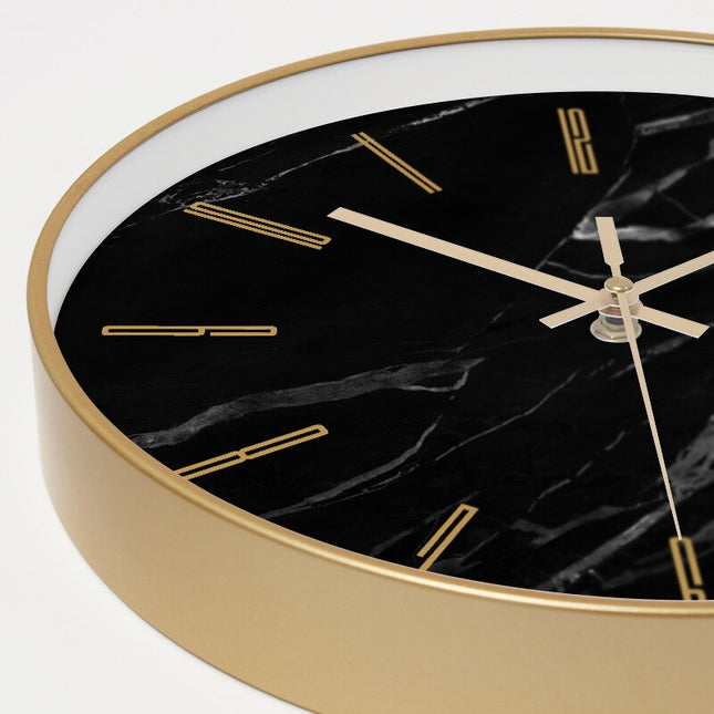 Ronde wandklok met marmerlook en goud