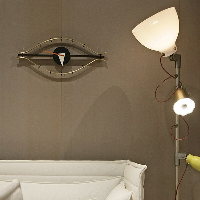 Retro design wandklok in oogvorm