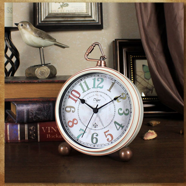 Vintage goudkleurige wekker met bel