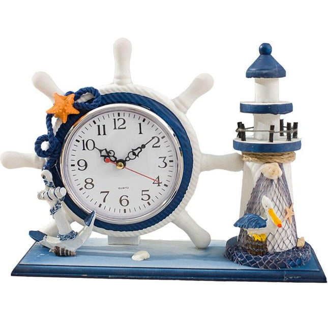 Tafelklok met stuurwiel en vuurtoren