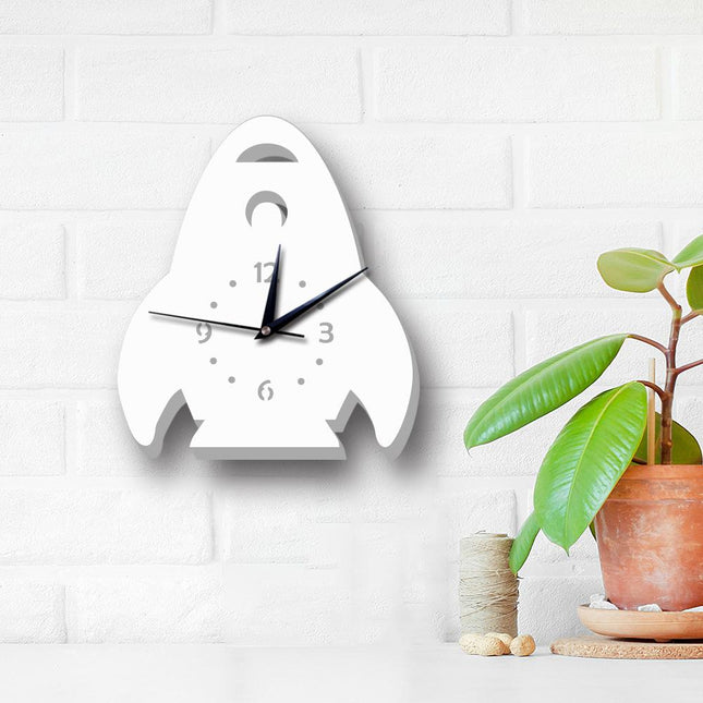 Witte kinderklok in vorm van raket