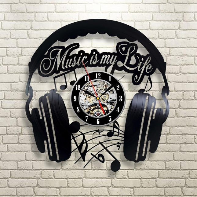 Muziek koptelefoon vinylplaat klok