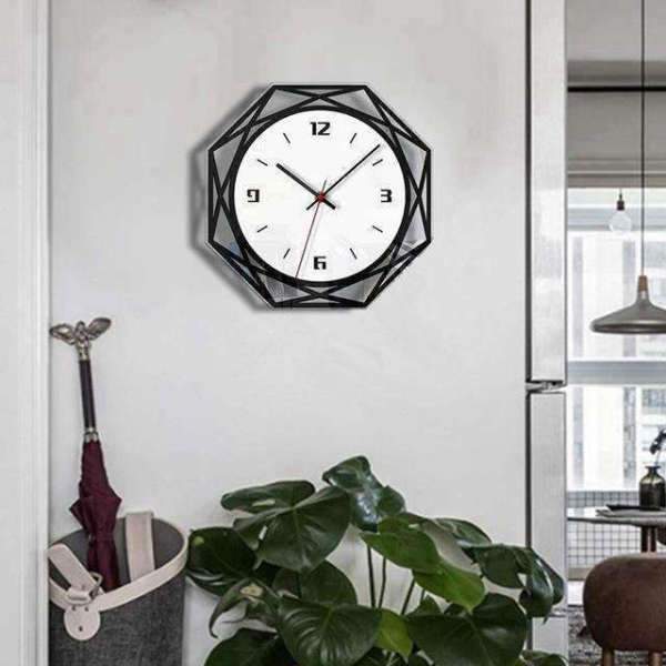 Geometrische wandklok in zwart en wit
